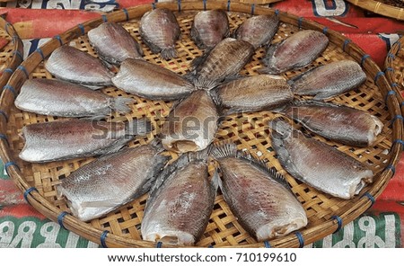 dried fish in basket.