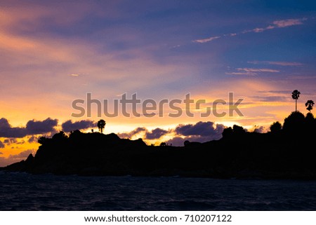 Silhouette of Island with Background of Sunset Twilight Sky, Phuket, Thailand.