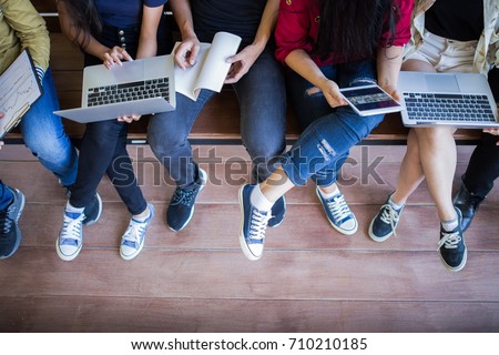 Back to school education knowledge college university concept, Young people being used computer and tablet, Education and technology concept. Royalty-Free Stock Photo #710210185