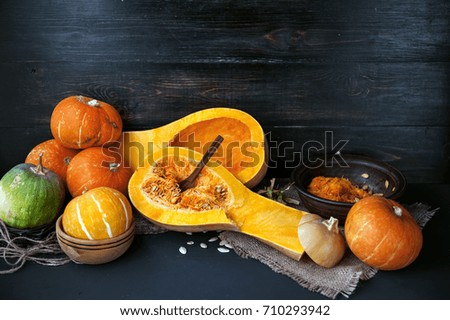 pumpkin with seeds on a wooden background