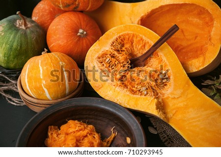 pumpkin with seeds on a wooden background