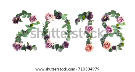 Year 2018, photo number design with white paper on the leaves and rose flowers background.