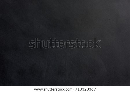 Blackboard with space to add text or graphic design.
Chalk stains on blackboard. 
education of school concept.  
