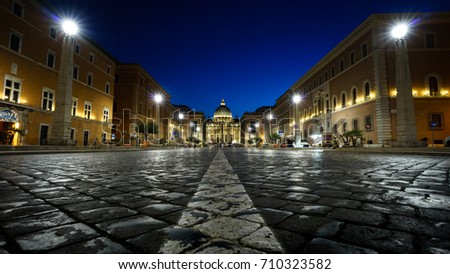 Cityscape image of illuminated Saint Peter`s Basilica and Street Via della Conciliazione, Vatican City, Rome, Italy.