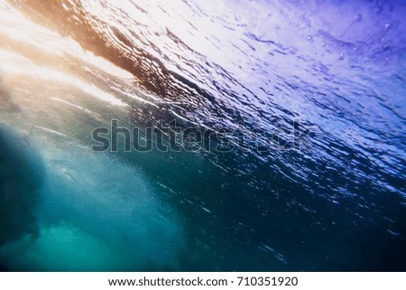 Sunrise Wave underwater. Tropical ocean in underwater