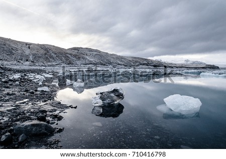 Ice blocks floating in Fjallsárlón Glacier Lagoon during winter in Iceland