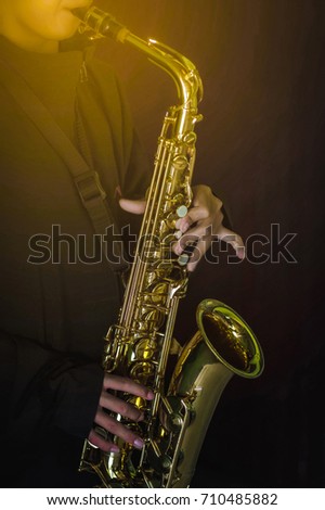 Musician saxophonist melodious.