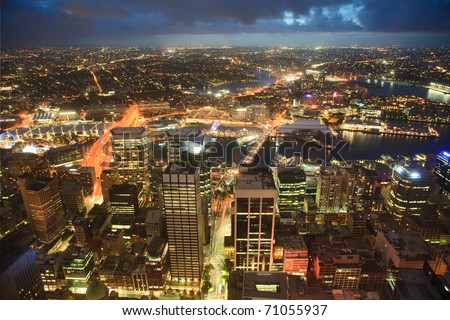 view on night highlighted Sydney CBD city from top Oztrack streets full of lights