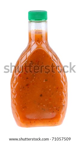 Bottle of Italian salad dressing isolated on white Royalty-Free Stock Photo #71057509