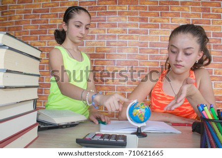 Two young attractive student Girls studying lessons. Education and school concept