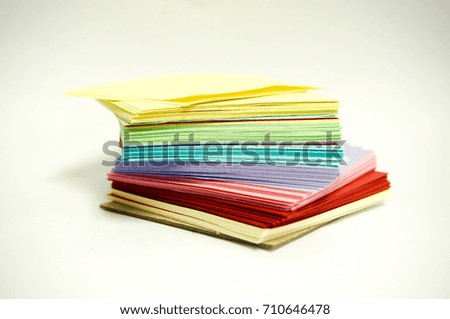 Colorful plain paper notes isolated on white background