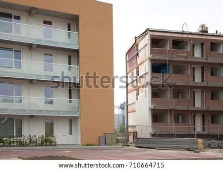 Demolishing a block of flats, selective focus