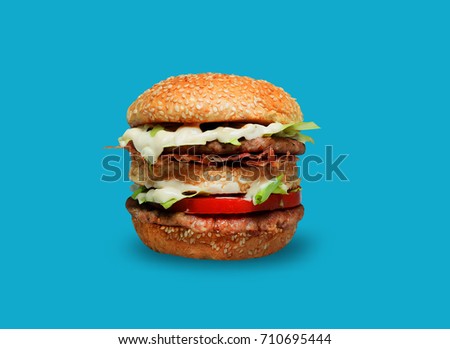 Big hamburger on blue background