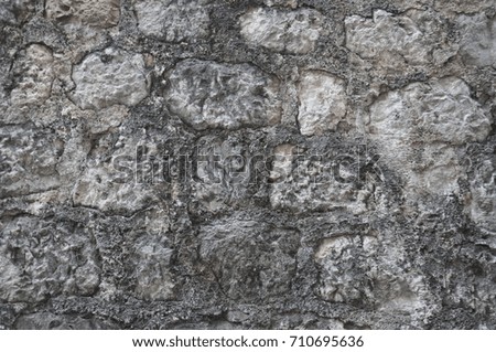 photo stone wall. masonry, a bunch of stones.