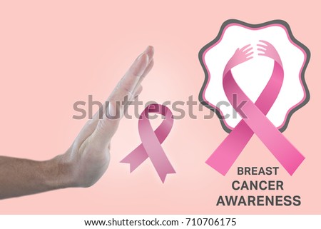 Hand of man pretending to touch invisible screen against light pink