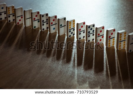 Dominos on wooden background