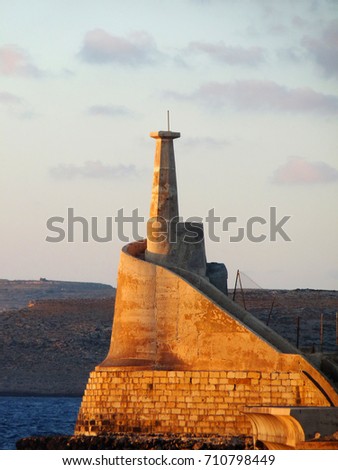 Lighthouse at the sunset, Malta