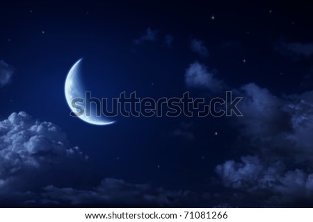 Big moon and stars in a cloudy night blue sky. fantastic beautiful landscape