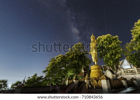 Milky Way over Buddha statue in Thailand,long explosure photography