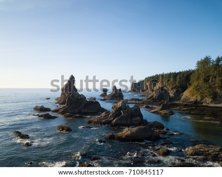 Aerial panorama of a beautiful rocky landscape at West Coast on Pacific Ocean. Picture taken at Shi Shi Beach, Neah Bay, Washington, United States of America, during a sunny summer day.