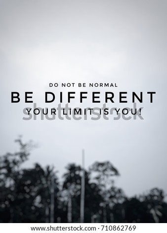 Inspirational quote about being different on blurred background