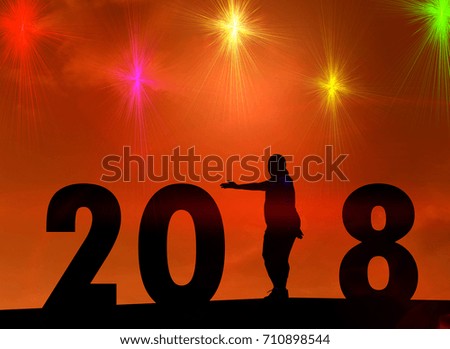 Silhouette happy new year 2018 of young woman exercise.concept alphabet Number welcome New Year celebration 2018.
