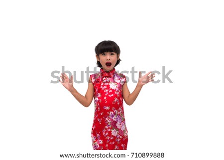 emotion of Asian Chinese little girl wearing traditional costume in isolated white background.