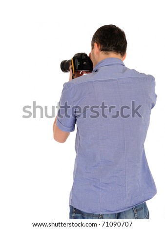  professional male photographer from back taking picture.copyspace . isolated on white background