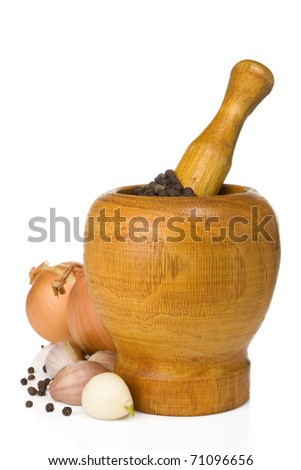 garlic, onion and pepper in pot isolated on white background