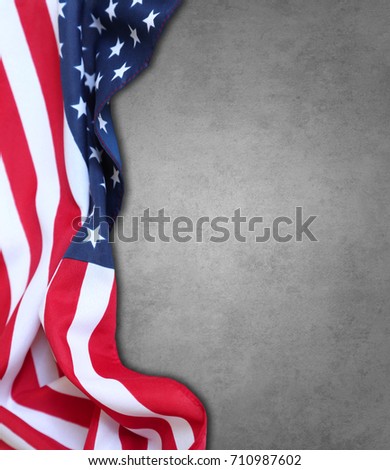 Closeup of American flag on grey background