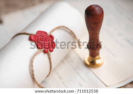 Notary's public pen and stamp on testament and last will. Notary public tools Royalty-Free Stock Photo #711012538