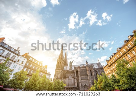Sunset view on the famous cathedral from the Victory square in Clermont-Ferrand city in France Royalty-Free Stock Photo #711029263
