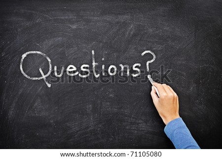 Question written on chalkboard / blackboard. Hand writing with chalk - great texture. Royalty-Free Stock Photo #71105080