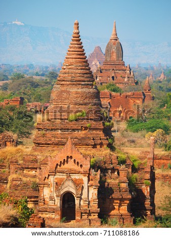 Ancient pagodas valley in Bagan, blue sky in background