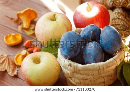 autumn composition, harvest, fruits - mushrooms, apples plums leaves autumn mood