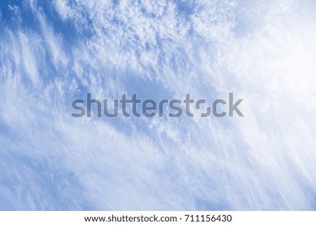 Fantastic soft white clouds against blue sky
