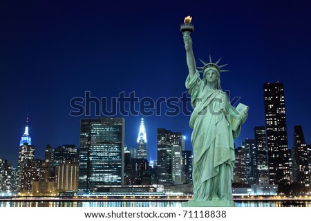 Manhattan Skyline and The Statue of Liberty at Night Lights, New York City