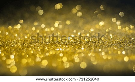 Gold glitter lights bokeh abstract background.