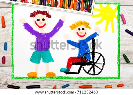 Photo of colorful drawing: Smiling boy sitting on his wheelchair. Disabled boy with a friend