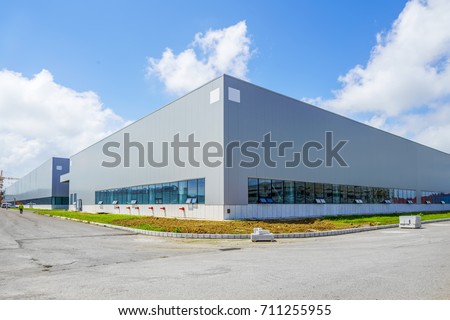 A modern factory building Royalty-Free Stock Photo #711255955
