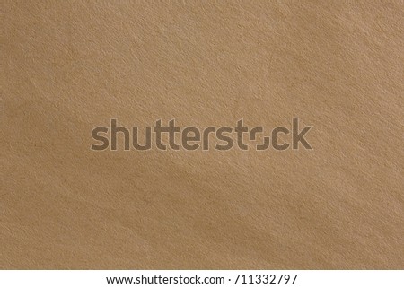 Brown rough crumpled recycled paper texture