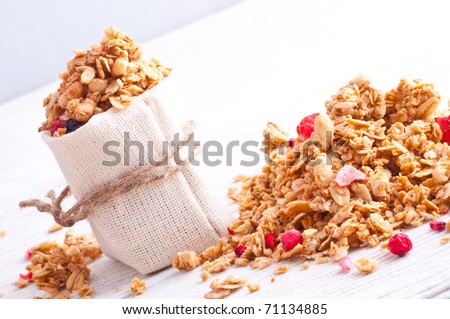 muesli and berry in small sack