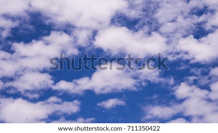 blue sky  background with tiny clouds