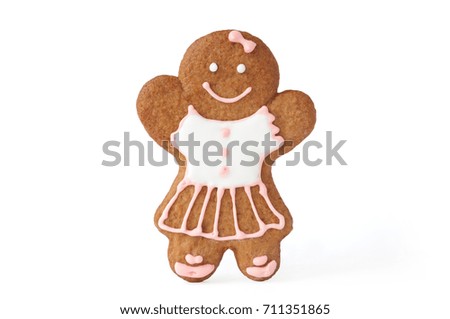 Homemade gingerbread man. Picture for a menu or a confectionery catalog. Invitation or greeting card. Isolated. Girl.