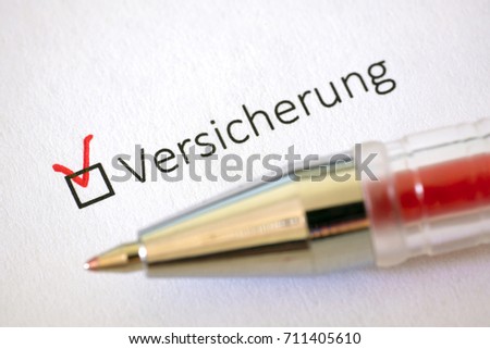 Questionnaire - red pen and the inscription INSURANCE with check mark on the white paper