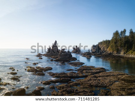 Aerial panorama of a beautiful rocky landscape at West Coast on Pacific Ocean. Picture taken at Shi Shi Beach, Neah Bay, Washington, United States of America, during a sunny summer day.