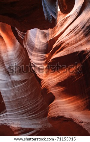 Beautiful slot canyon in Arizona, with patterns of color and shapes in the red sandstone rock