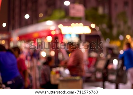 The Mexican Vendors on the Street at Night in the City of Los Angeles; Blur Background with Bokeh Effects