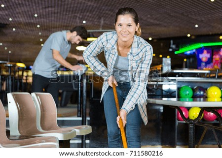 woman cleaning social venue