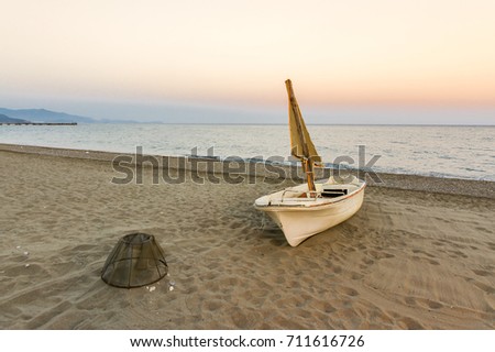 Caretta Caretta loggerhead sea turtles lay their eggs at Anamur Beach every year and boat on the beach.